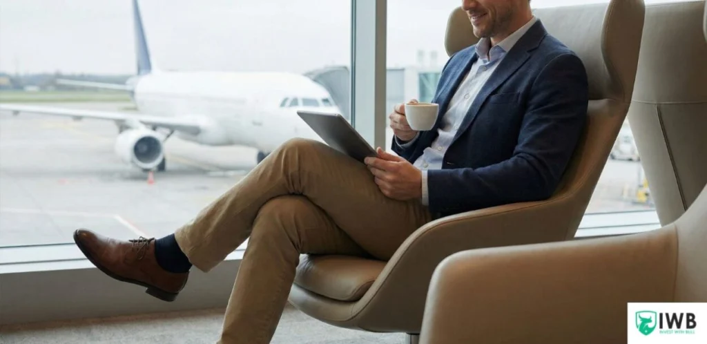 7 Best Credit Cards for Salaried People in India (2026 Guide) – Unlock Maximum Savings 4 A salaried professional enjoying complimentary domestic airport lounge access, a premium benefit of credit cards like YES Prosperity Edge, while waiting for a flight.